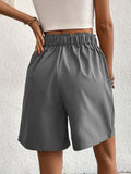 Pocketed Half Elastic Waist Shorts