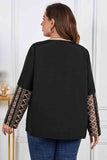 Melo Apparel Plus Size Printed Round Neck Tie Front Blouse